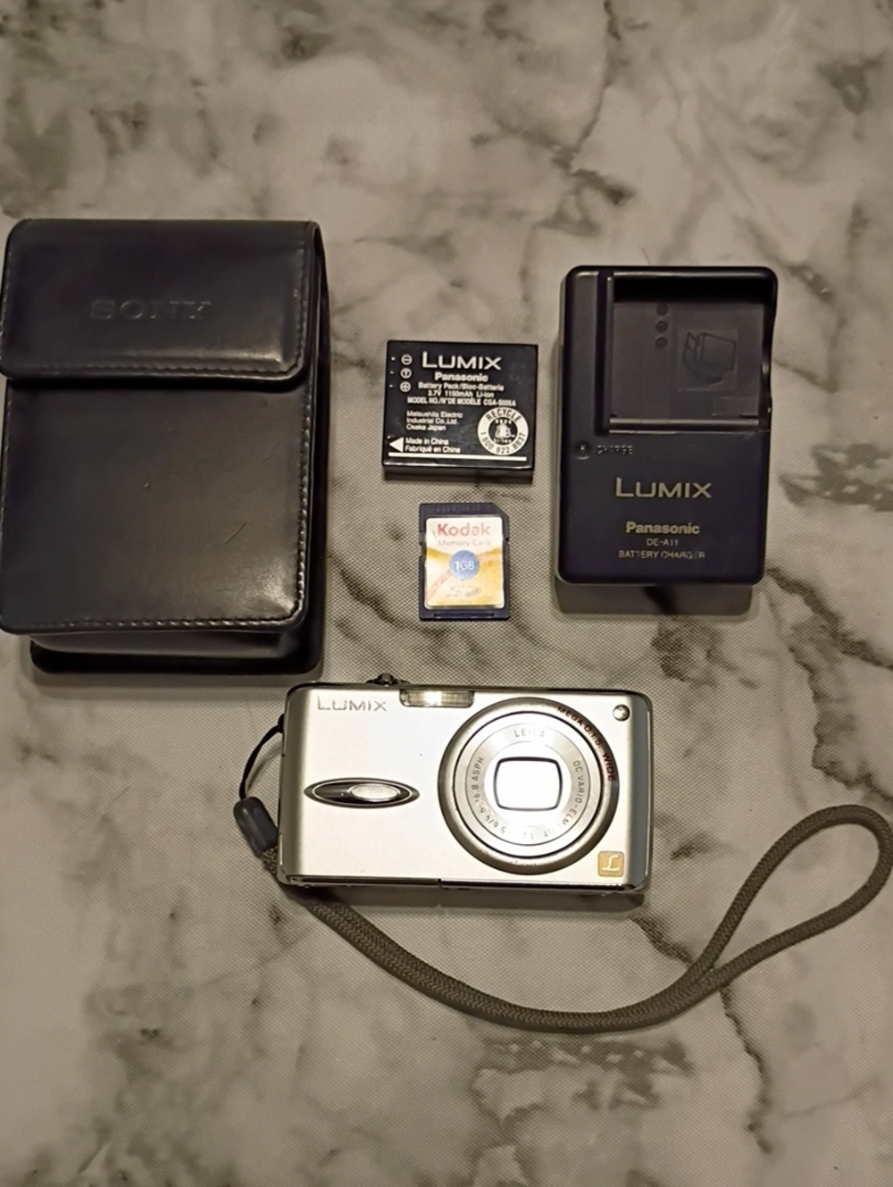 Panasonic Lumix Silver Compact Digital Camera with Charger and Case